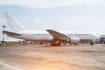 White big plane in the parking at the airport