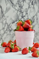 Strawberries on the light background 