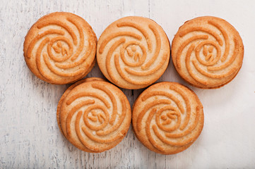 Fototapeta premium Chocolate chip cookies on the old wooden background, food.