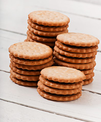 Chocolate chip cookies on the old wooden background, food.