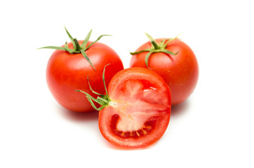 Tomatoes isolated on white. With clipping path.