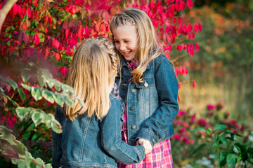 Two Young Caucasian Sisters