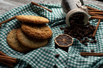 still-life homemade cookies coffee beans, orange slices, cinnamon
