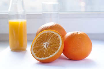 Isolated drink. Glass of orange juice and slices of orange fruit isolated on white background