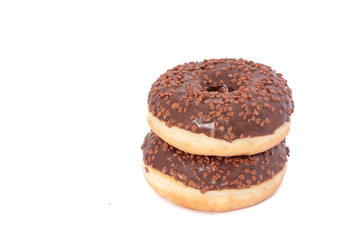 Two Chocolate Donuts with Sprinkles. Isolated on a White Background