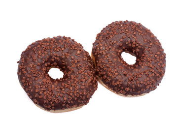 Two Chocolate Donuts with Sprinkles. Isolated on a White Background