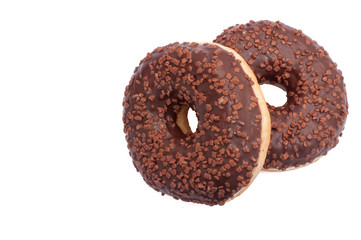 Two Chocolate Donuts with Sprinkles. Isolated on a White Background