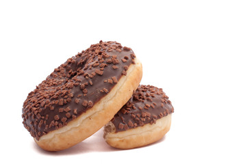 Two Chocolate Donuts with Sprinkles. Isolated on a White Background