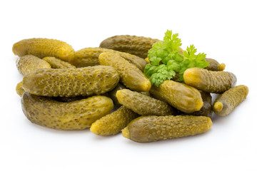Marinated pickled cucumbers isolated on the white.
