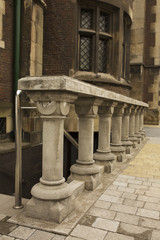 Fototapeta premium Stone staircase with balusters near old church