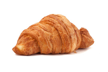 Fresh and tasty croissant over isolated white background