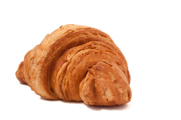 Fresh and tasty croissant over isolated white background
