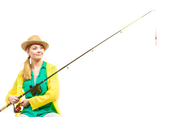 Woman with fishing rod , spinning equipment