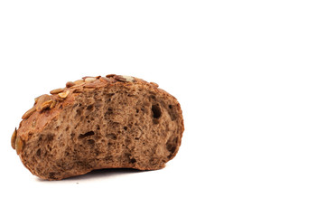 round a bun with pumpkin seeds wherein is isolated on a white background