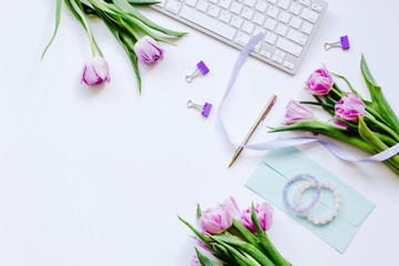 Trendy design of workdesk with blossom on white background top view mock-up