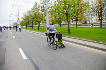 BELARUS, MINSK - APRIL 30/2016: On the central streets of Minsk hosted the annual bicycle carnival in which everyone participated.