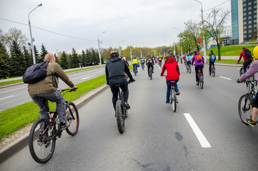 BELARUS, MINSK - APRIL 30/2016: On the central streets of Minsk hosted the annual bicycle carnival in which everyone participated.
