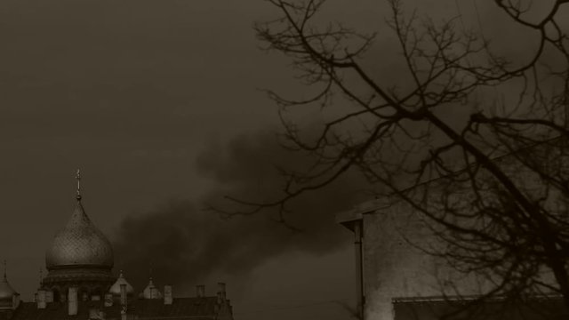 Burning church. Lot of smoke. Sepia
