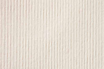 Texture of light cream striped paper close-up with small inclusions for watercolor and artwork....