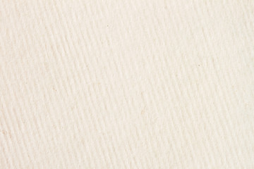 Texture of light cream in a diagonally strip paper with small inclusions for watercolor and artwork. Modern background, backdrop, substrate, composition use with copy space