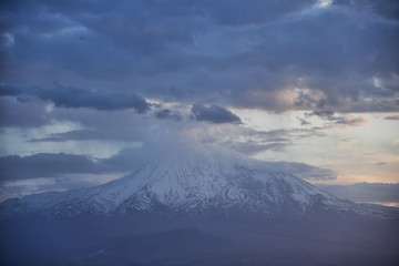 Fototapeta na wymiar Mount Ararat in the clouds at sunset