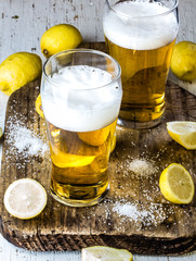 Beer , lemon and salt. Ingredientes for cocktail michelada - latin american mexican chilean beer drink