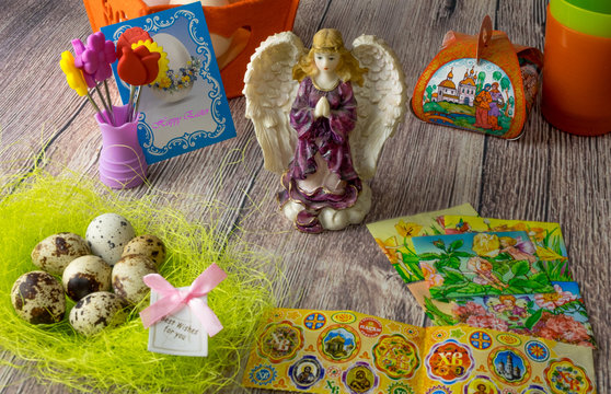 Colored Easter eggs table decoration with angel