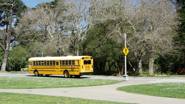 School bus driving at the Golden Gate Park in San Francisco