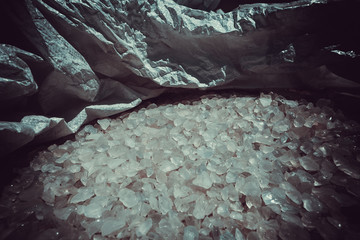 Many round clystal white glass transparent stones pattern wallpaper texture Pebbles in a bag