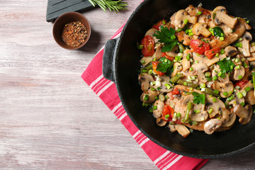 Pan with tasty chicken marsala on table