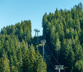 Summer view of the chair lifts on the ski trail named Alberta Tomba which is one of the stages of...