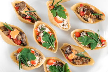 Plate with stuffed pasta, closeup