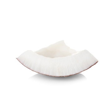 Tasty piece of coconut on white background