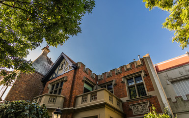 Traditional classic old architecture houses and green trees in Palermo Chico neighborhood, Buenos Aires, Argentina