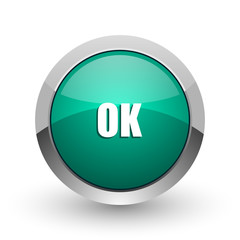 Ok silver metallic chrome web design green round internet icon with shadow on white background.