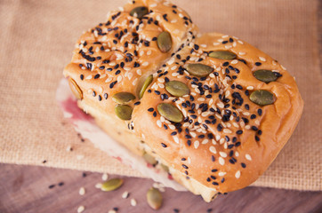 fresh bread and wheat on the wooden