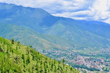 Fototapeta na wymiar Beautiful Scenery of Thimphu City Nestled by the Himalayan Mountain Ranges