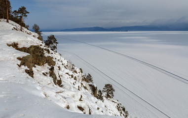 Naklejka premium Road on the ice of winter lake Baikal