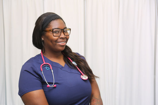 Portrait Of A Happy African American Female Healthcare Professional, Portrait Of A Nurse With Stethoscope