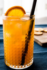 Orange Cocktail with ice cubes