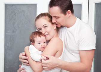 Happy family with a newborn baby