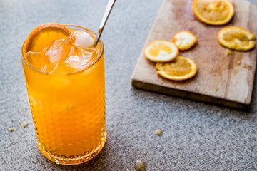 Orange Cocktail with ice cubes