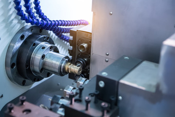 Fototapeta na wymiar Milling cutting metalworking process at industrial CNC machining of metal factory