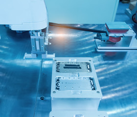 Robotic machine vision system in phone factory