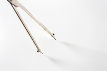 Drafting instrument on white macro