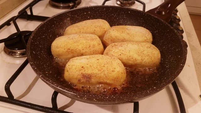Appetizing cutlets from potato stuffed with mushrooms are fried in vegetable oil