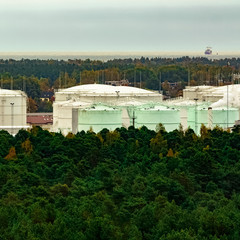 Fototapeta na wymiar Fuel terminal in Riga. Large oil tanks