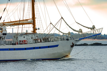 White sailing ship coming from Baltic sea and entering Riga