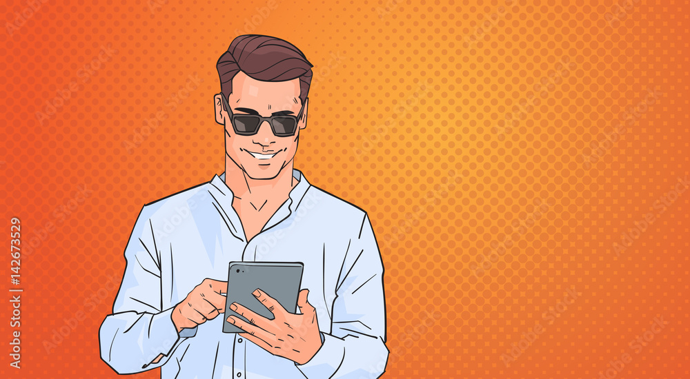 Poster young man using tablet computer networking online over pop art colorful retro style background vecto
