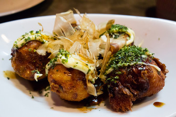 Fried Octopus balls with sauce and dried fish flakes